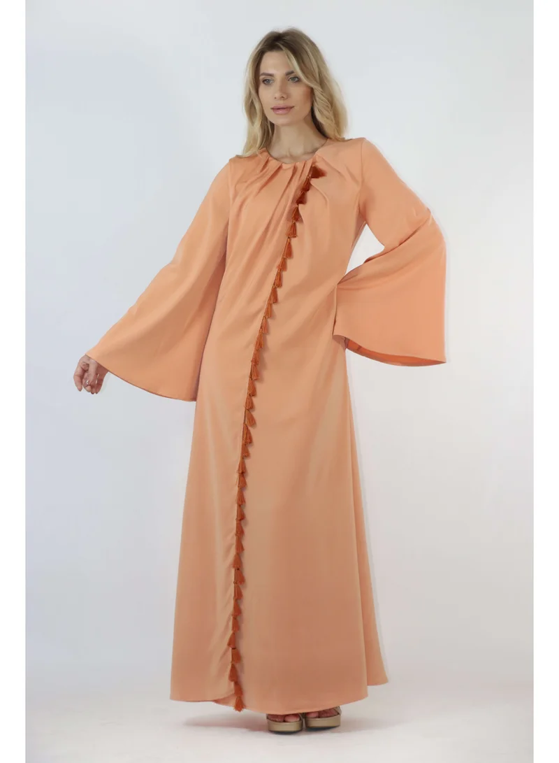 توترندس جلابية أورانج بتفاصيل أكمام واسعة